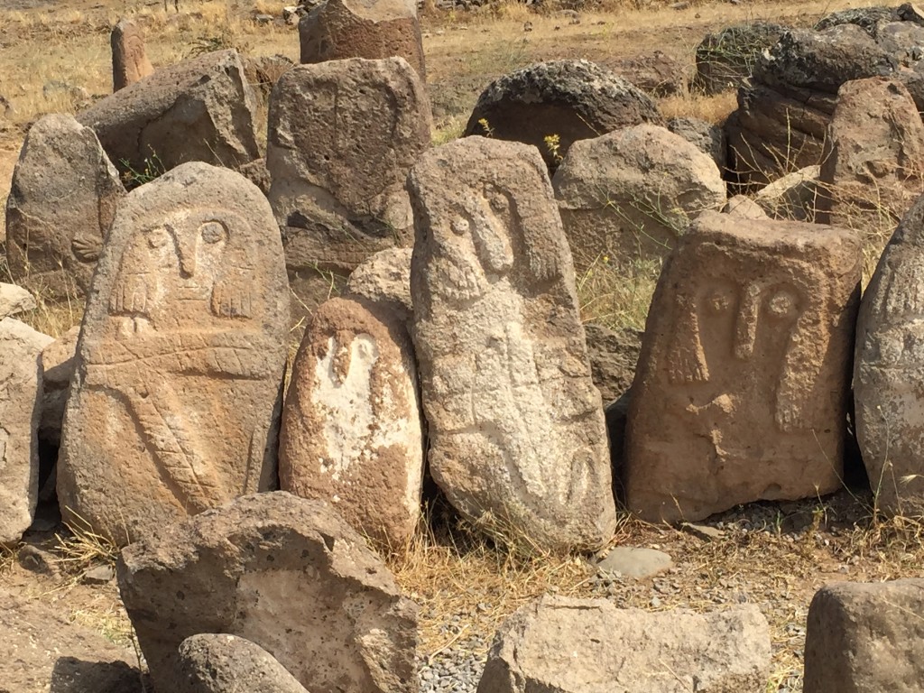 gravestones of gushing human-face patterns in Yari city